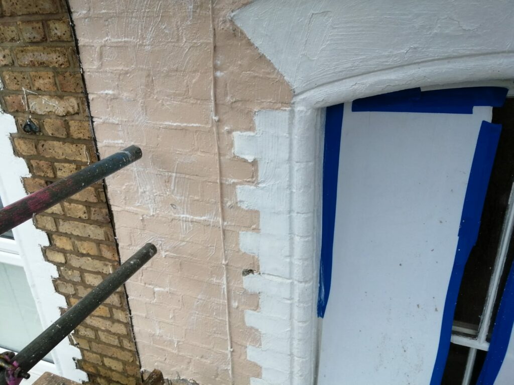 Paint removal from bricks on residential property