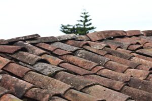Roof Stains, A roof with a lot of tiles on it in need of exterior cleaning.