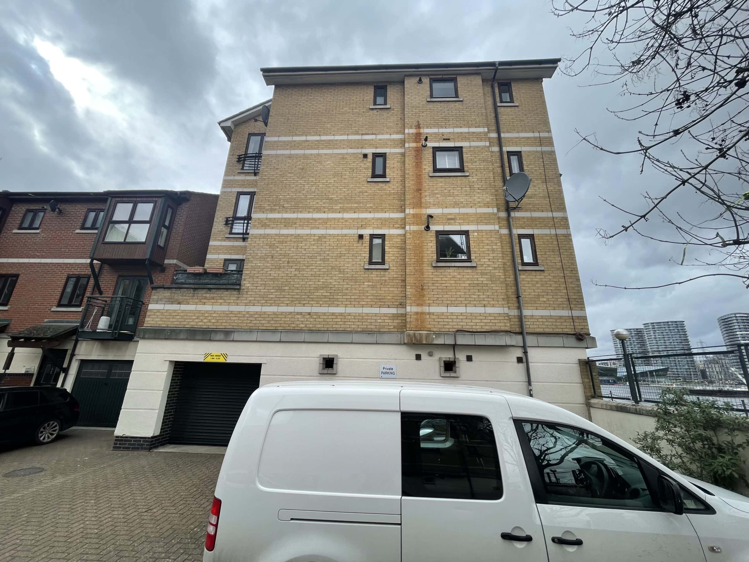 Stains, Removing, Pipe Stains. Rust Stain on Building